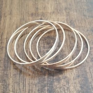 Set of 5 silver tone bangles